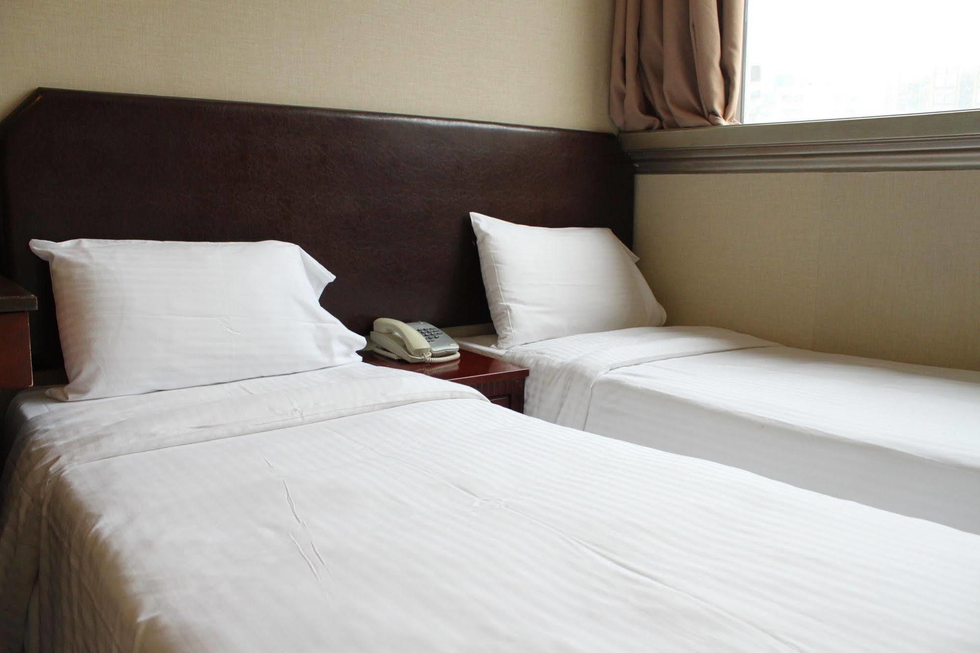 Oriental Lander Hotel Цзюлун Экстерьер фото